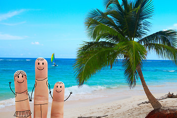 Image showing Happy family on the beach. Exotic vacation