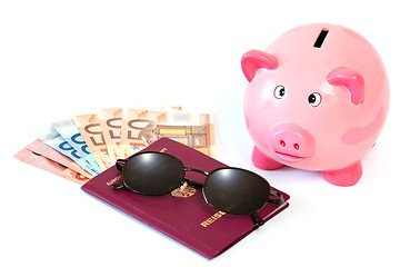 Image showing Passport with money and piggy bank