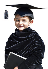 Image showing Happy kid graduate with graduation cap