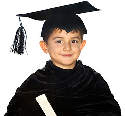 Image showing Happy kid graduate with graduation cap