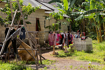 Image showing Washed clothes drying outside