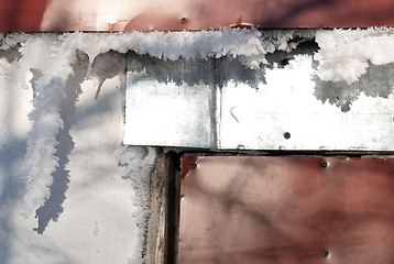 Image showing the frozen snow on the doors