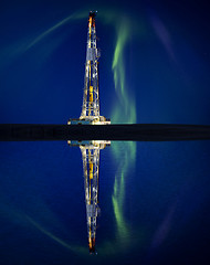 Image showing Drilling Rig and Lake Reflection