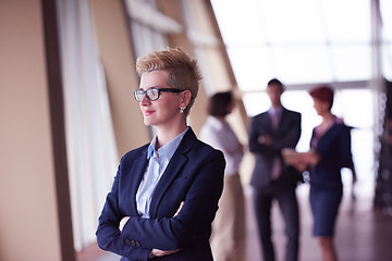 Image showing business people group, woman in front  as team leader