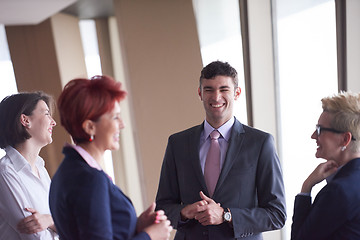 Image showing business people group on meeting at modern bright office