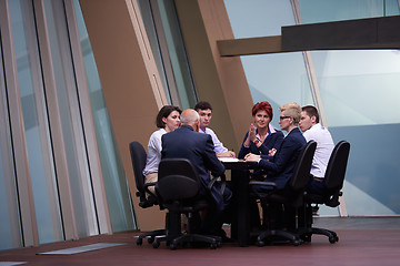 Image showing business people group on meeting at modern bright office