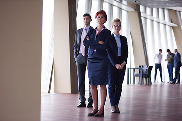 Image showing diverse business people group with redhair  woman in front