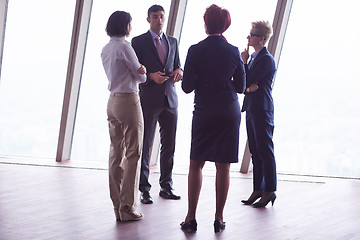 Image showing business people group on meeting at modern bright office