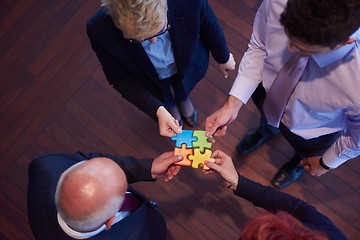 Image showing assembling jigsaw puzzle