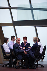 Image showing business people group on meeting at modern bright office