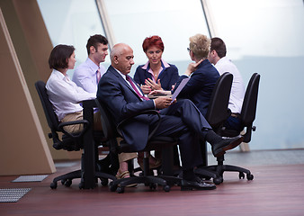 Image showing business people group on meeting at modern bright office