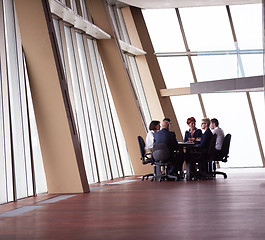 Image showing business people group on meeting at modern bright office