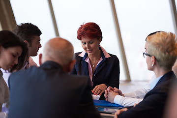 Image showing business people group on meeting at modern bright office