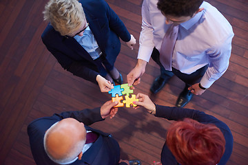 Image showing assembling jigsaw puzzle