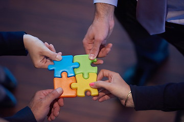 Image showing assembling jigsaw puzzle