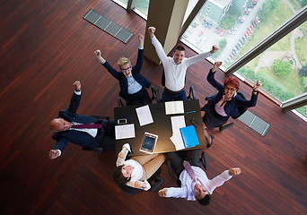 Image showing top view of business people group throwing dociments in air