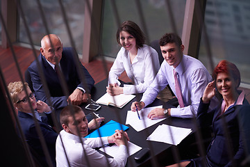 Image showing business people group on meeting at modern bright office