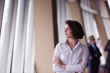 Image showing young startup  business woman portrait, lbured people group in b