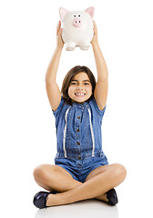 Image showing Holding a piggybank