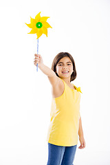 Image showing Playing with a windmill