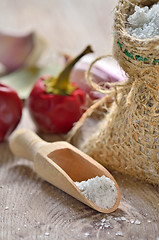 Image showing Salt spoon on wooden background