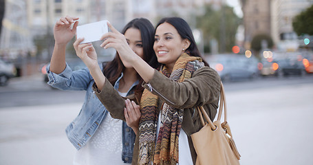 Image showing Two gorgeous women posing for a selfie