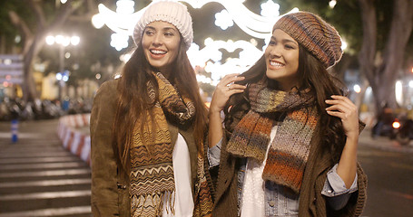 Image showing Two young women enjoying a night on the town