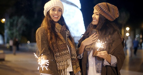 Image showing Attractive young women having fun at Christmas