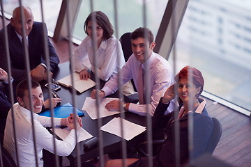 Image showing business people group on meeting at modern bright office