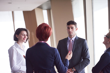 Image showing business people group on meeting at modern bright office