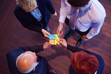 Image showing assembling jigsaw puzzle