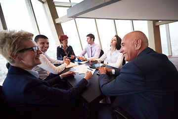 Image showing business people group on meeting at modern bright office