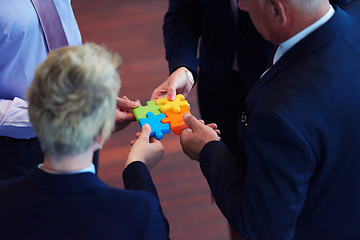 Image showing assembling jigsaw puzzle