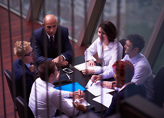 Image showing business people group on meeting at modern bright office