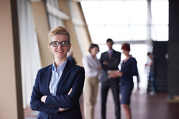 Image showing business people group, woman in front  as team leader