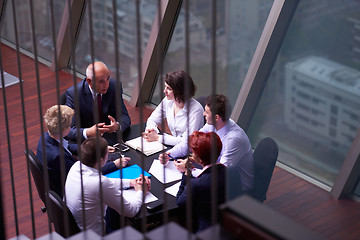 Image showing business people group on meeting at modern bright office