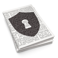 Image showing Privacy concept: Shield With Keyhole on Newspaper background