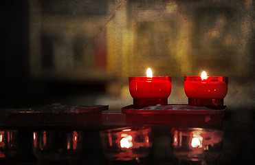 Image showing Candle burning in church - Vintage dirty look