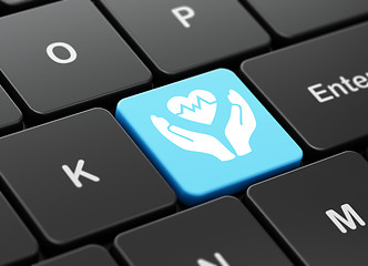 Image showing Insurance concept: Heart And Palm on computer keyboard background