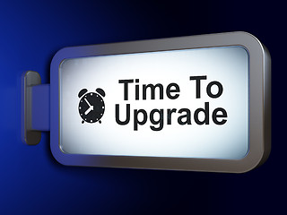 Image showing Time concept: Time To Upgrade and Alarm Clock on billboard background