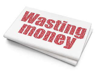 Image showing Money concept: Wasting Money on Blank Newspaper background