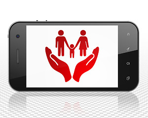 Image showing Insurance concept: Smartphone with Family And Palm on display