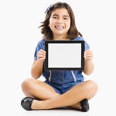 Image showing Young girl using a tablet