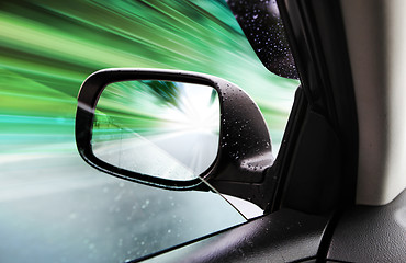 Image showing rear-view mirror of speed car