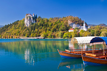 Image showing Traditional wooden boats on lake Bled.