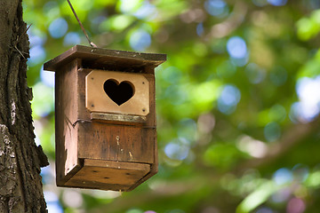 Image showing Bird house with the heart shapped entrance.