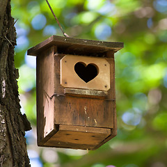 Image showing Bird house with the heart shapped entrance.