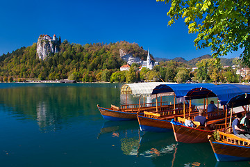 Image showing Traditional wooden boats on lake Bled.