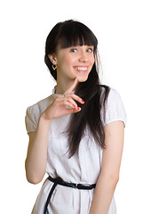 Image showing Friendly smiling young woman portrait studio shot