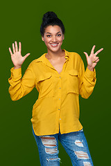 Image showing Woman showing eight fingers